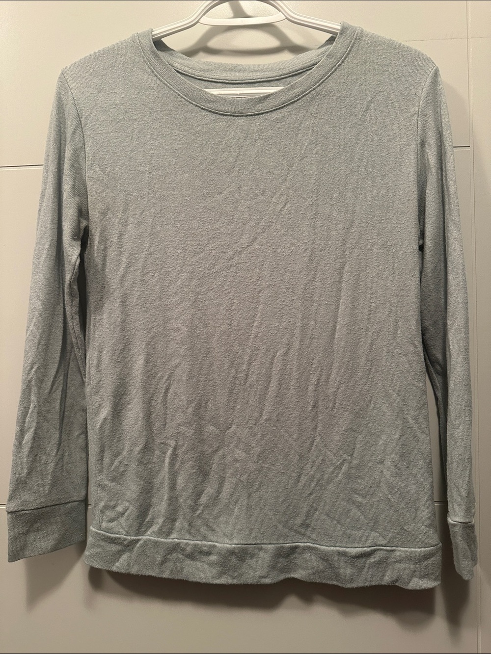 Icy blue Long Sleeve lightweight sweater by Zyia Active.